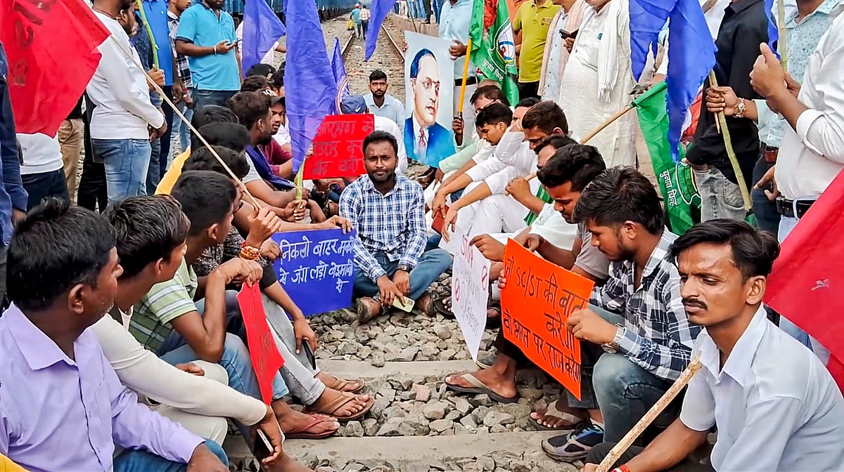 Bhim Army supporters block railway tracks in support of the Bharat Bandh call over the recent Supreme Court ruling on SC/ST reservations, in Arrah, Thursday, Aug. 21, 2024 - PTI